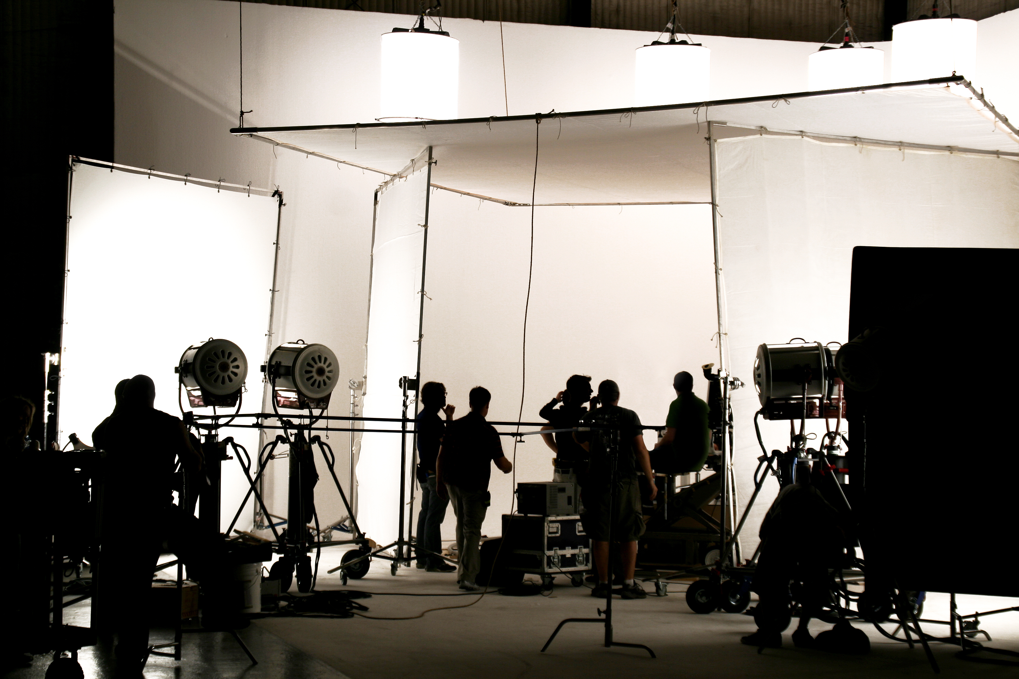 Film studio with lights and crew