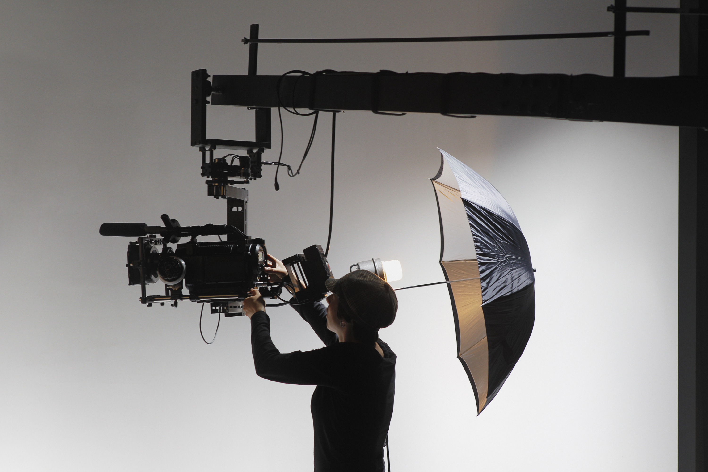 Videographer filming with a camera